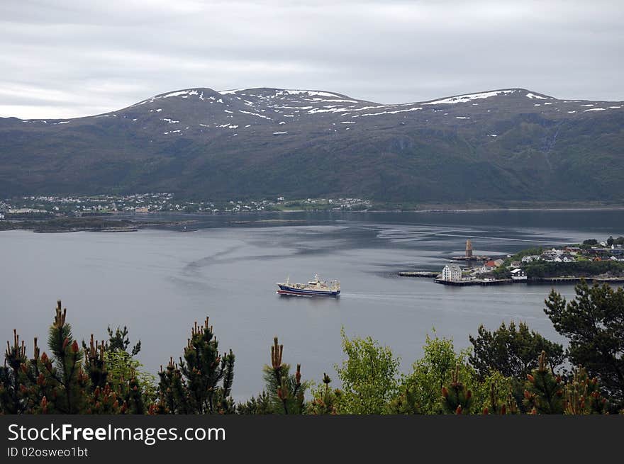 Boat on fjord at Alesund, Norway