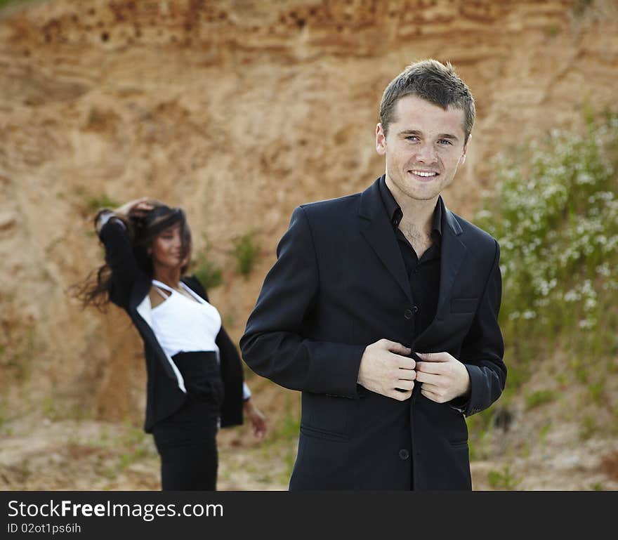 Portrait of smiling handsome businessman outdoor.