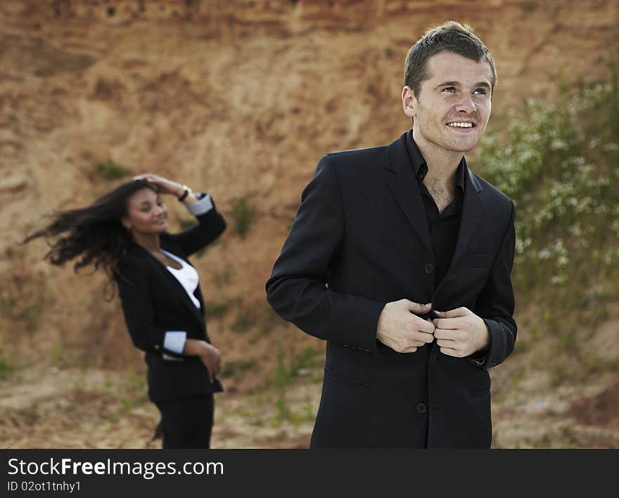 Portrait of smiling handsome businessman outdoor.