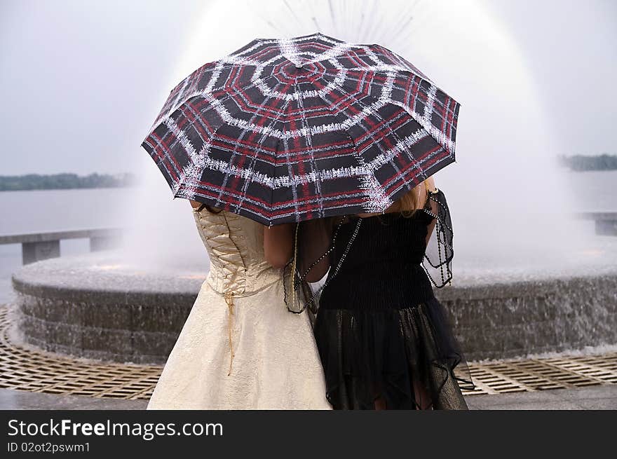 Young Women Under The Umbrella.