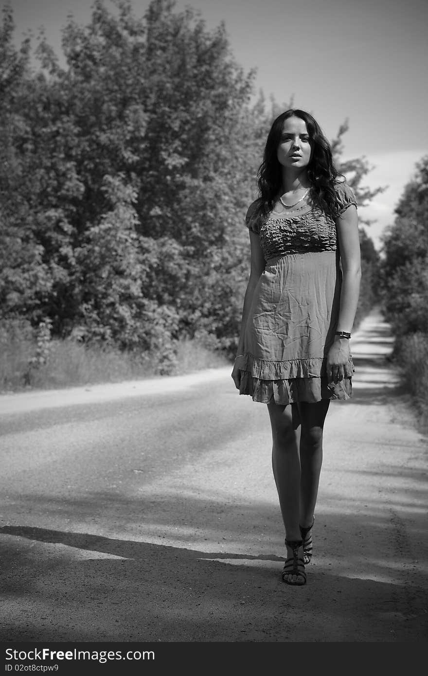 Portrait of beautiful girl outdoor. Black&White photo.