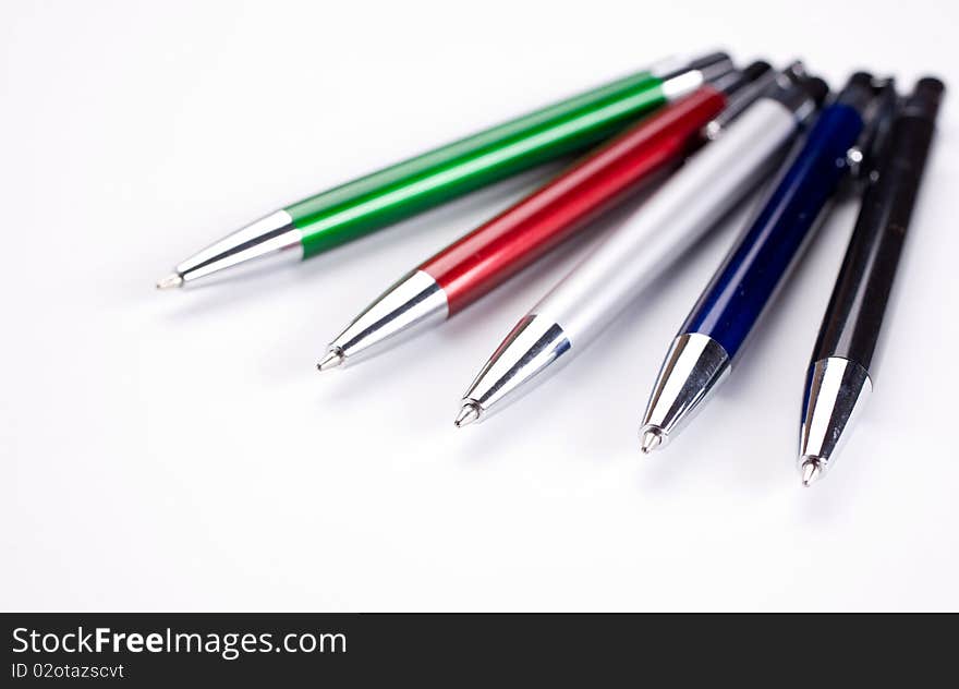 Colored pens on table