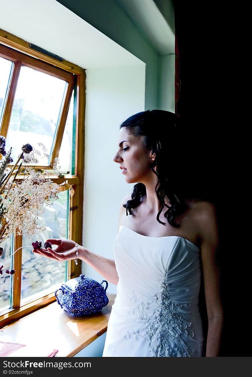 Closeup of Bride enjoying a quiet moment on her wedding day