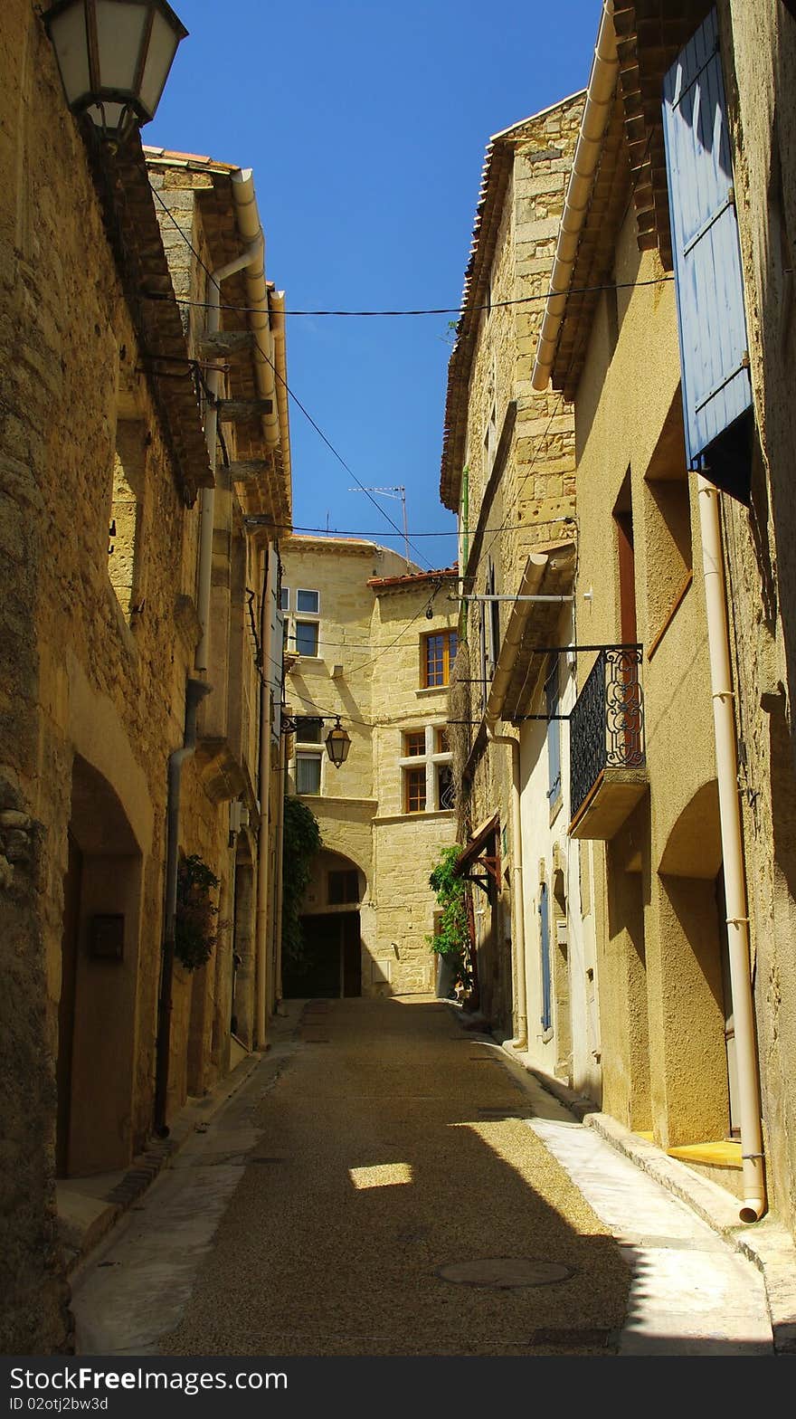 Narrow medieval street of nezignan l eveque