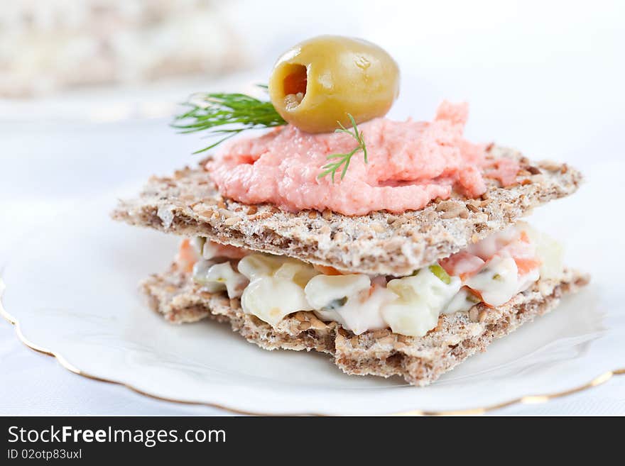 Sandwiches for catering event on white plate