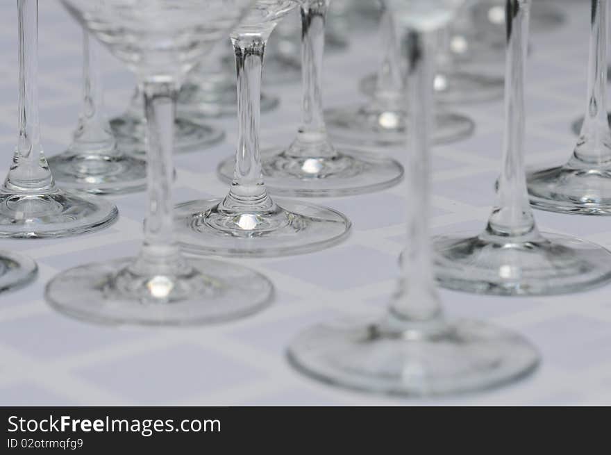 Rows Of Legs Of Wineglasses