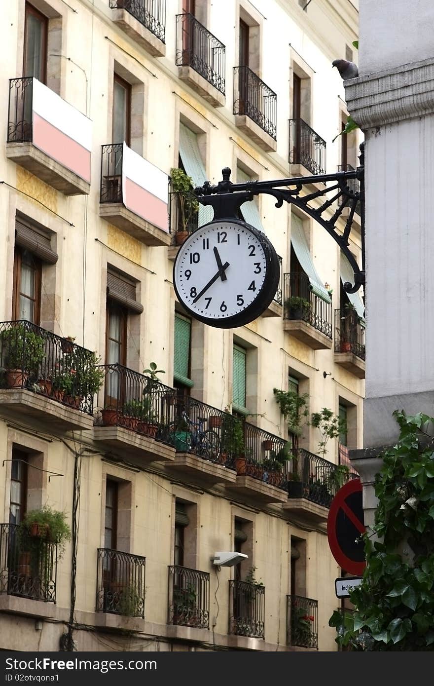 The clock in Barcelona, Spain. The clock in Barcelona, Spain