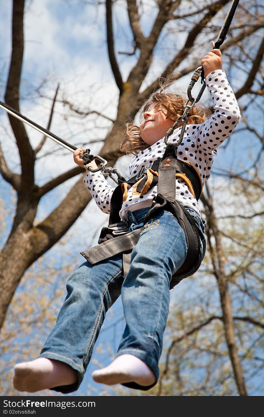 Little girl in a bungee