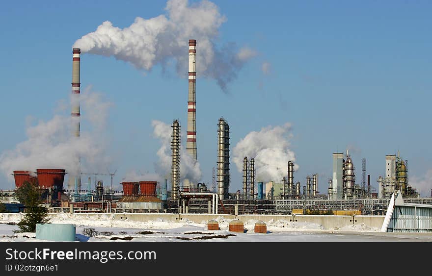 Refinery factory against the dark blue sky