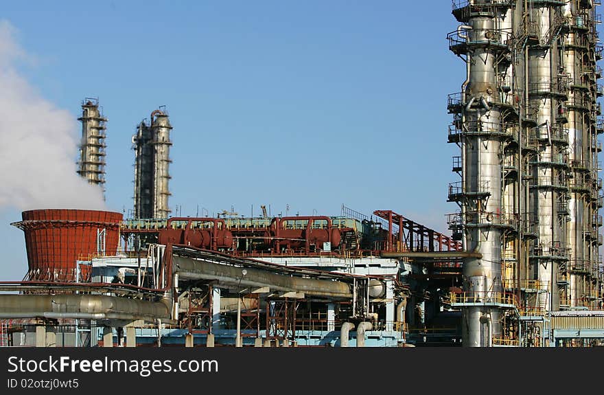 Refinery factory against the dark blue sky