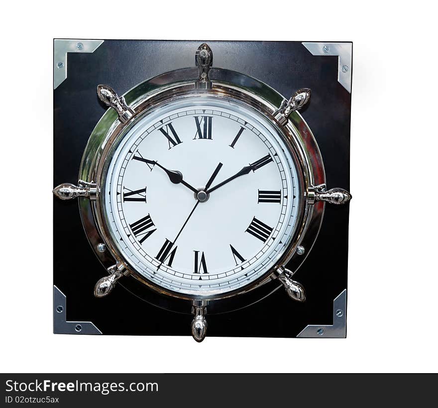 Old Clock with Roman numbers and ship wheel shape