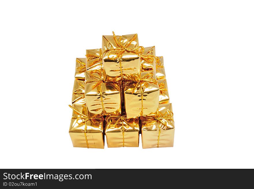 Isolated pyramide of small yellow gifts on white. Isolated pyramide of small yellow gifts on white