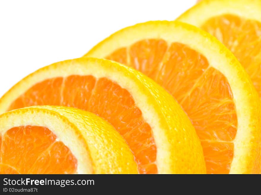 Close-up ripe slice orange on white background