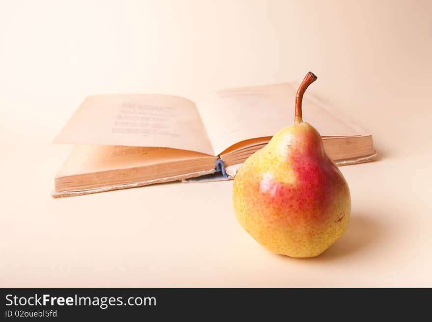 Pear And Old Book