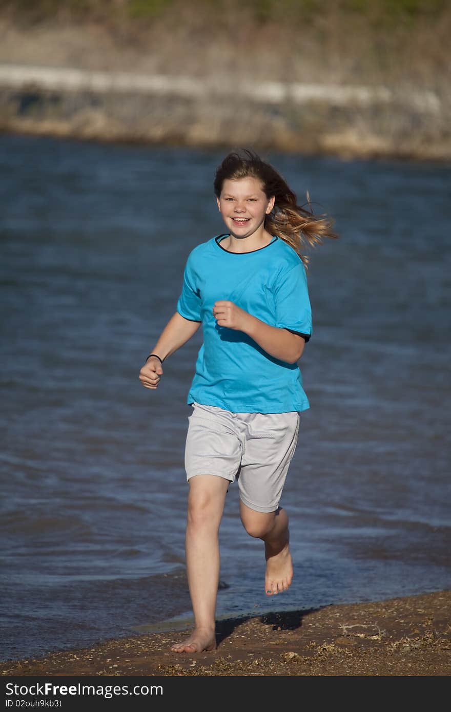 Girl Running On  Beach