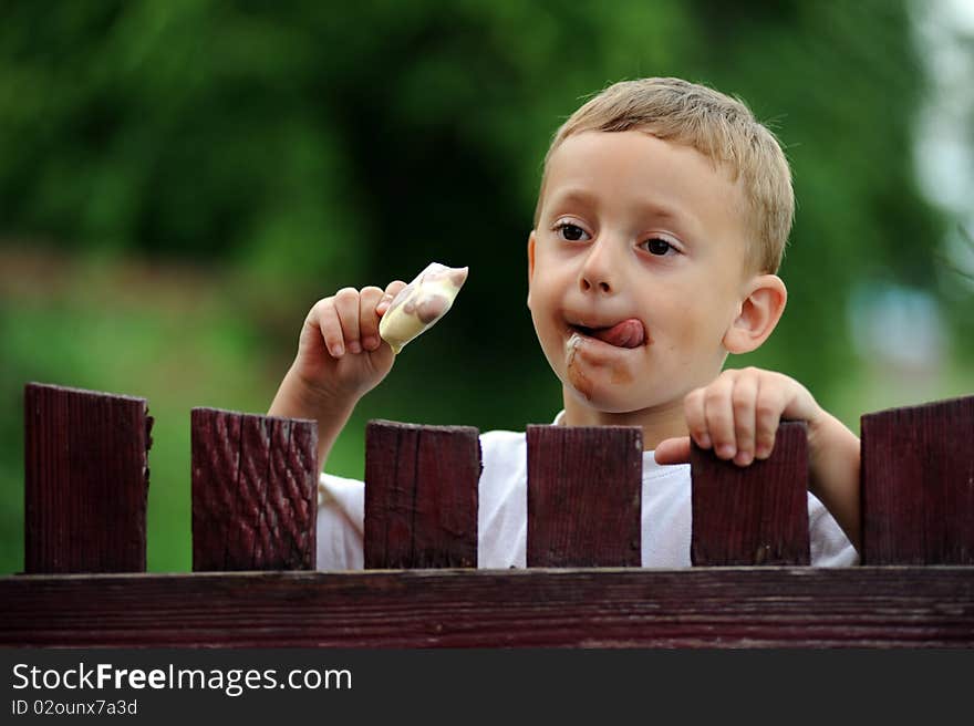 Young Boy Eating Ice Cream