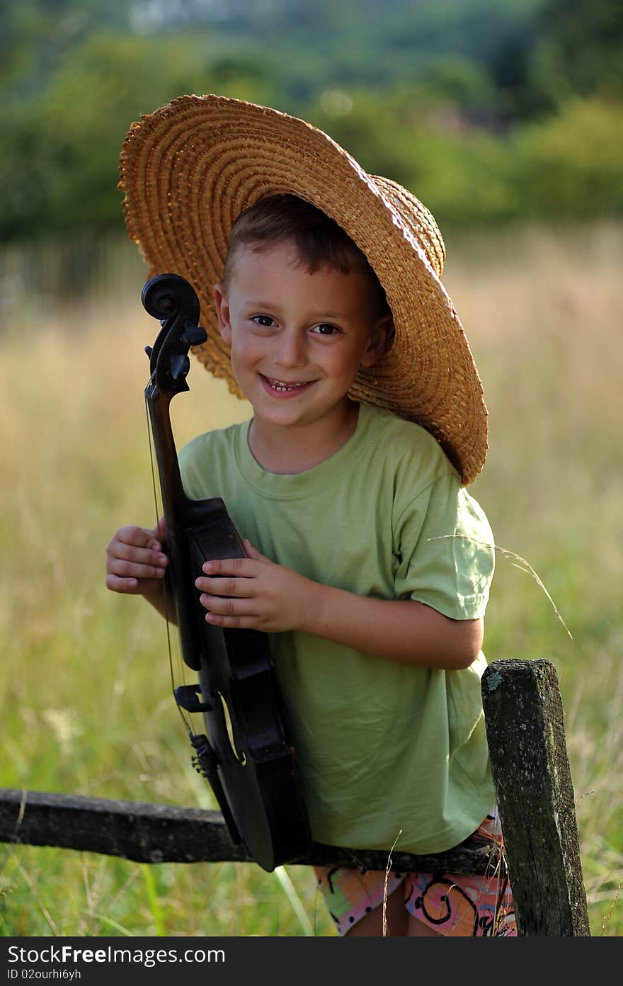 Portrait of a child playing the violin. Portrait of a child playing the violin