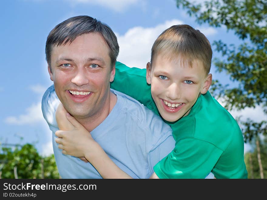 Father with his son in a park