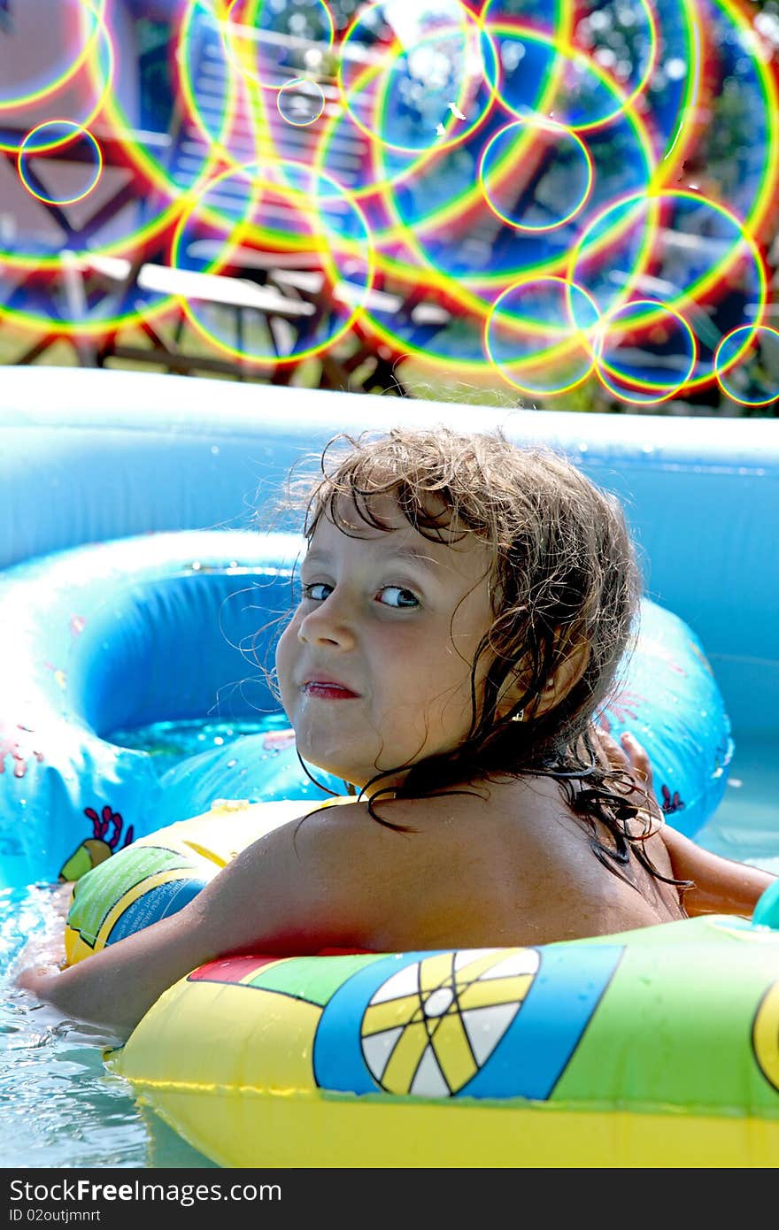 A beautiful girl in the pool