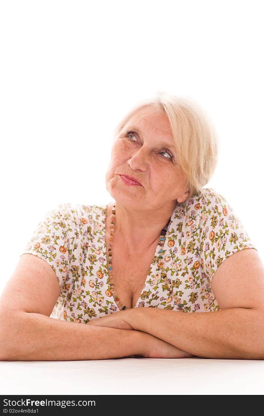 Beautiful older woman on a white background