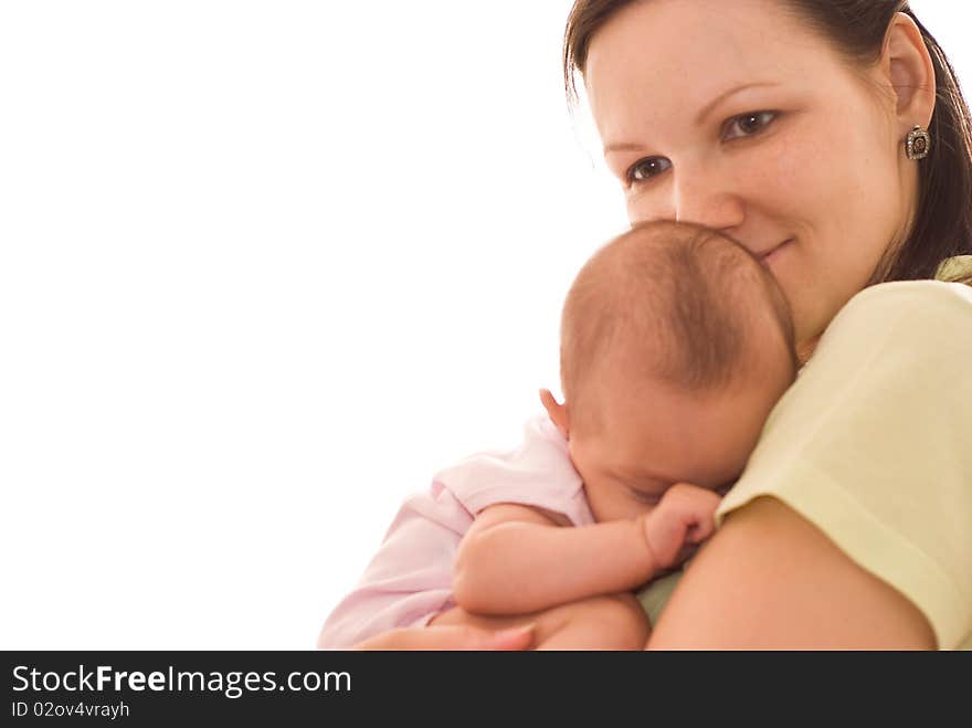 Mother stands and holds the baby. Mother stands and holds the baby