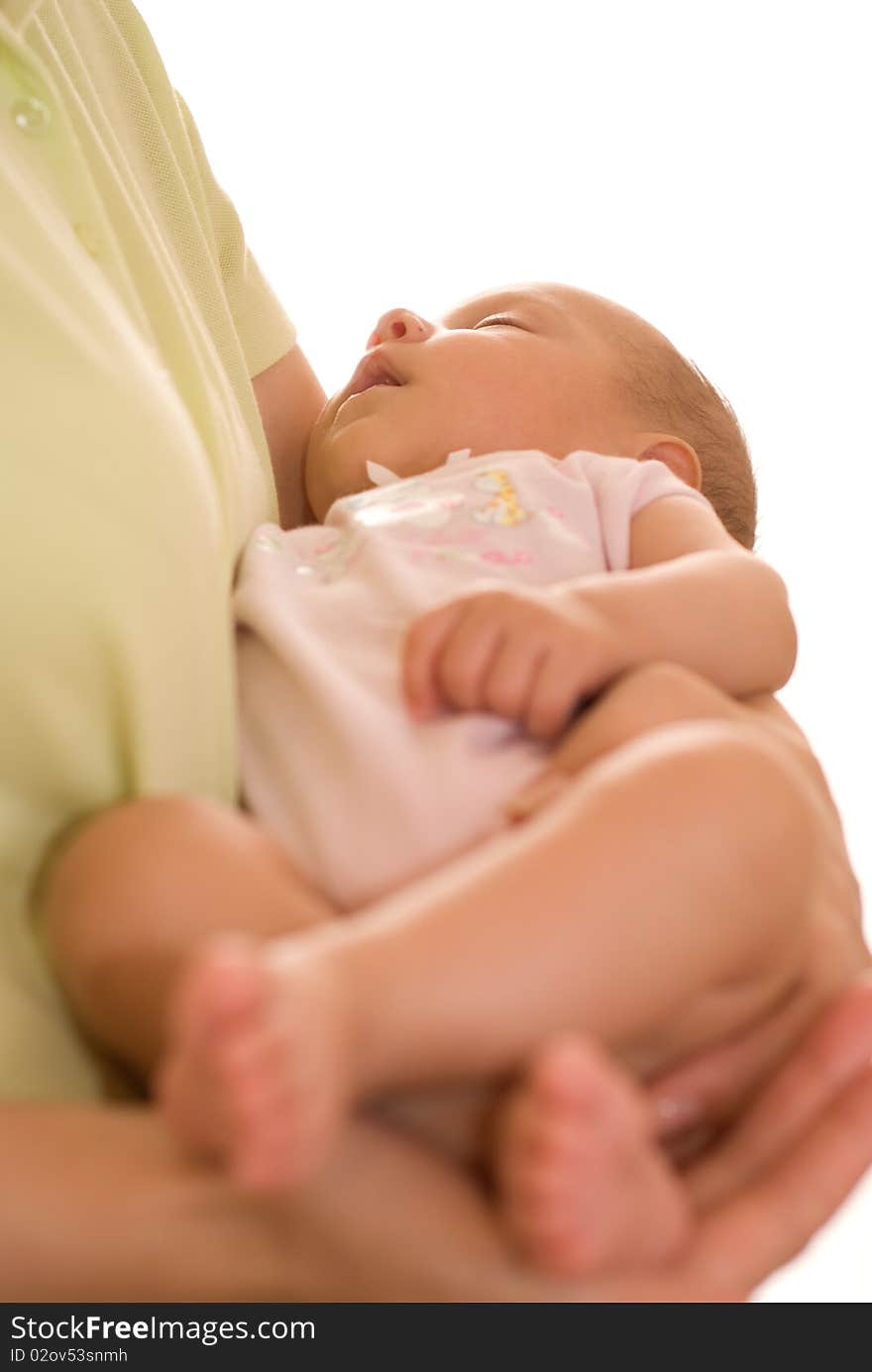 Mother stands and holds the baby. Mother stands and holds the baby