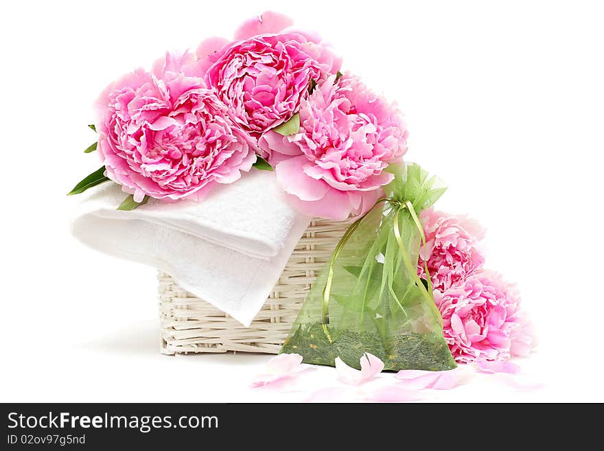 Spa aromatherapy: flower, white towel, bag of natural herbs. Soft focus. Spa aromatherapy: flower, white towel, bag of natural herbs. Soft focus