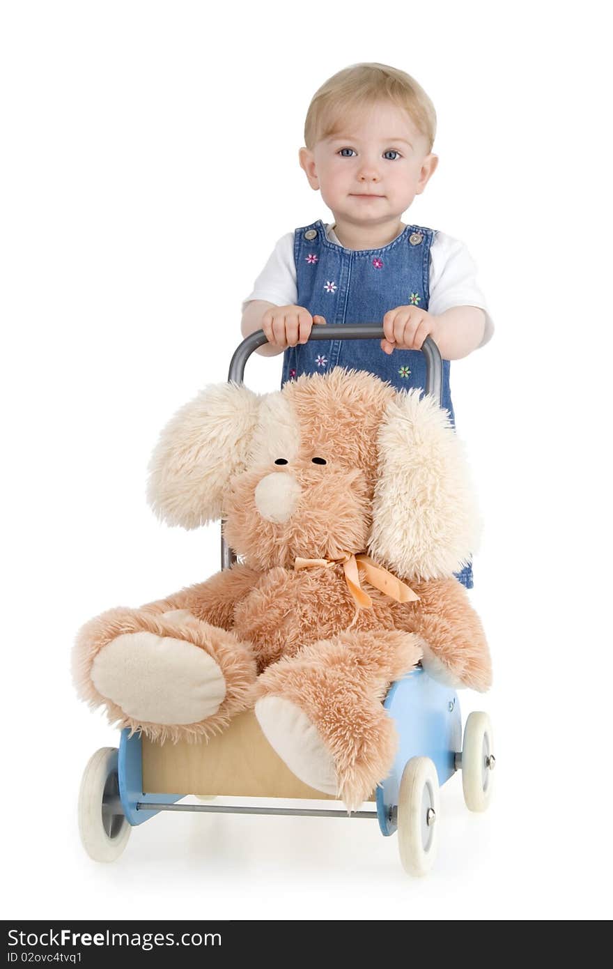 Infant with his toy on white background.