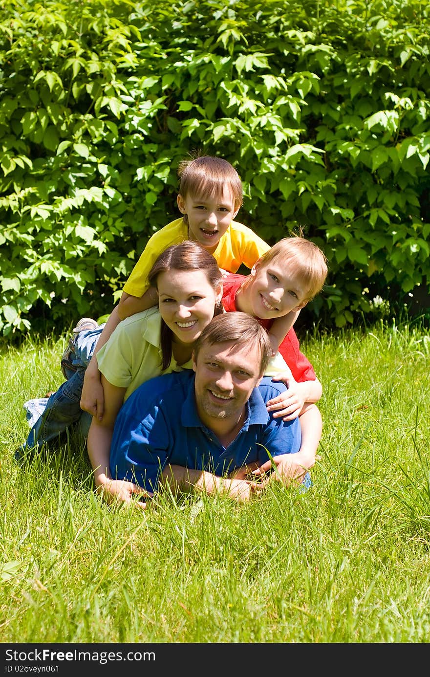 United happy family in the summer park. United happy family in the summer park