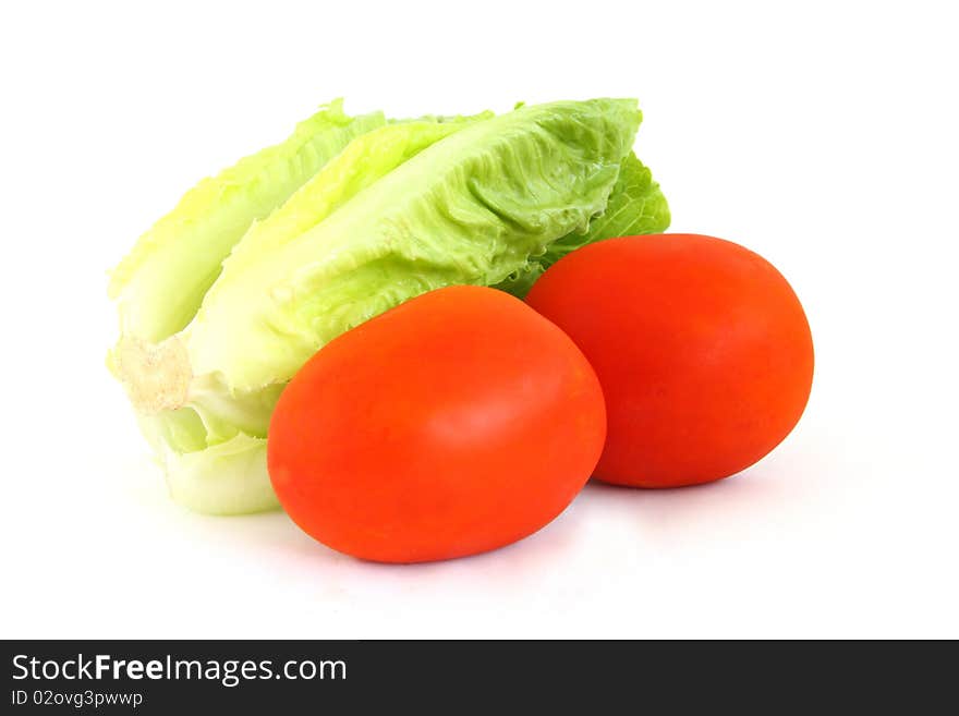 Healthy vegetables Tomato and lettuce isolated white background. Healthy vegetables Tomato and lettuce isolated white background