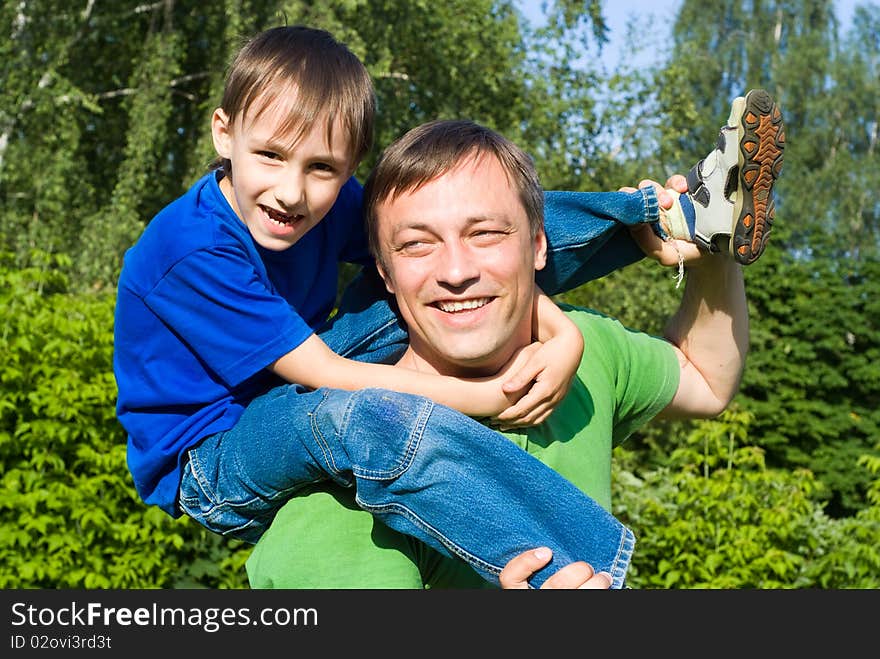 Father with his son in a park