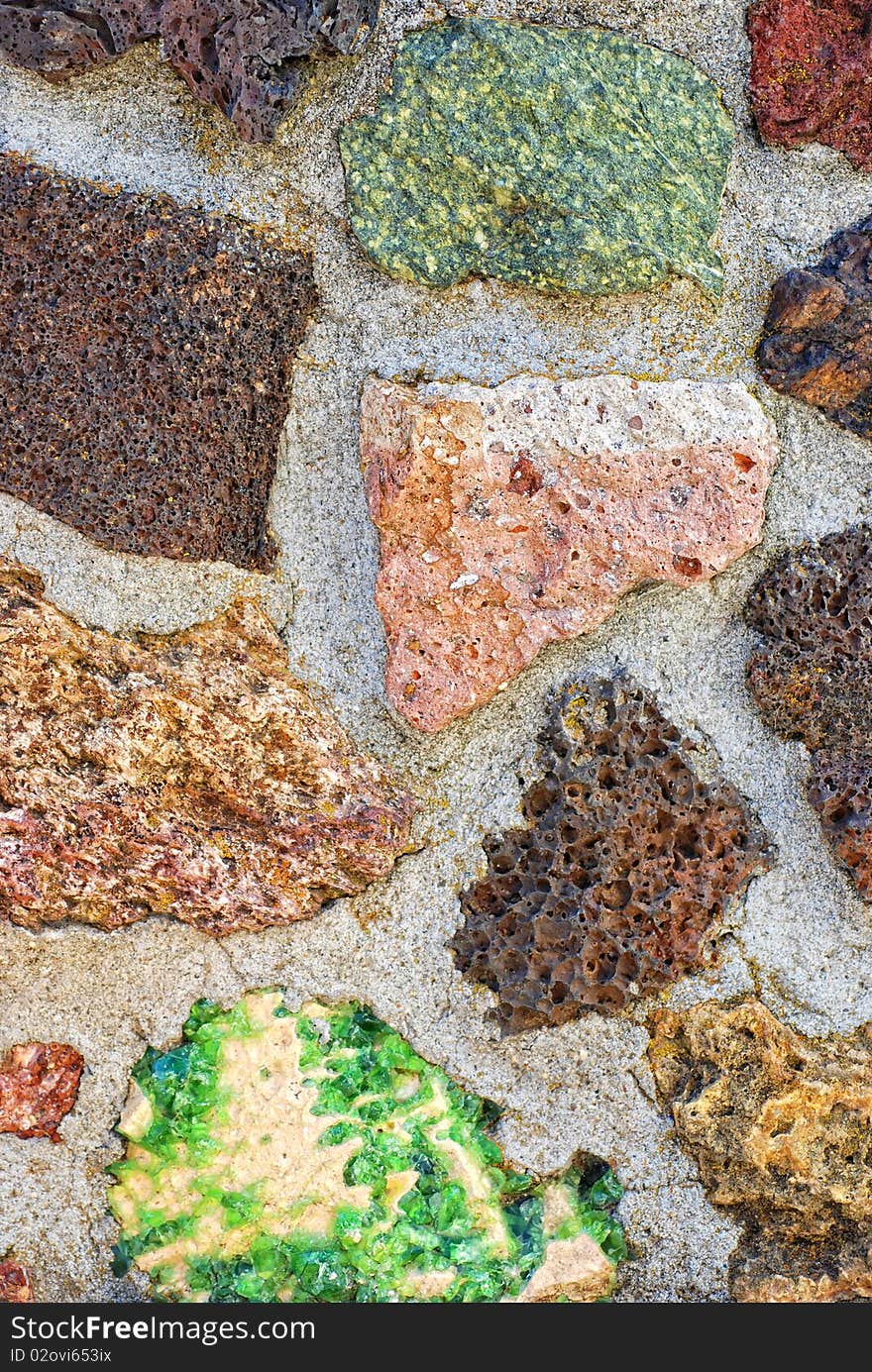 Wall constructed of various volcanic rocks, minerals, and crystals. Wall constructed of various volcanic rocks, minerals, and crystals