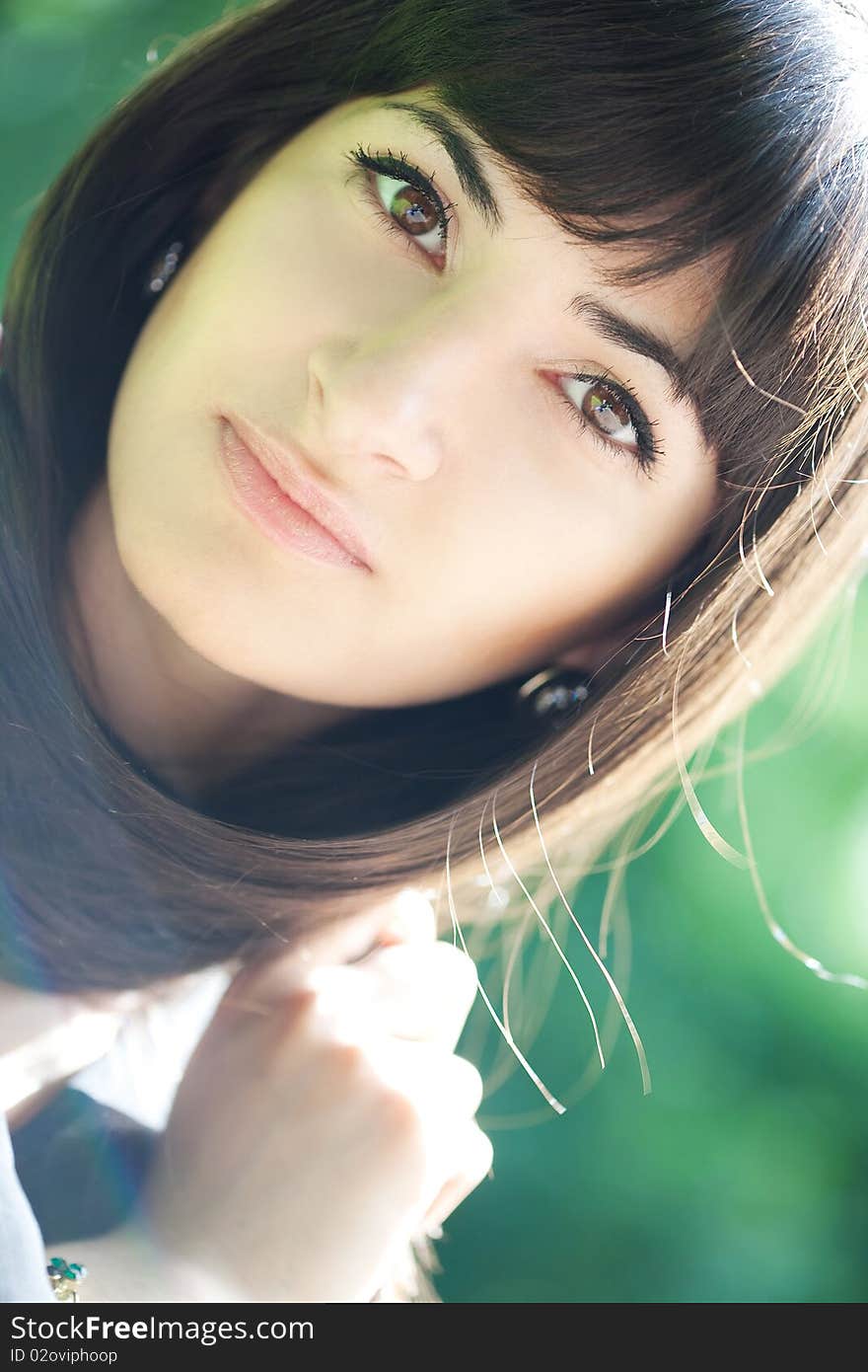 Young beautiful girl with long black hair