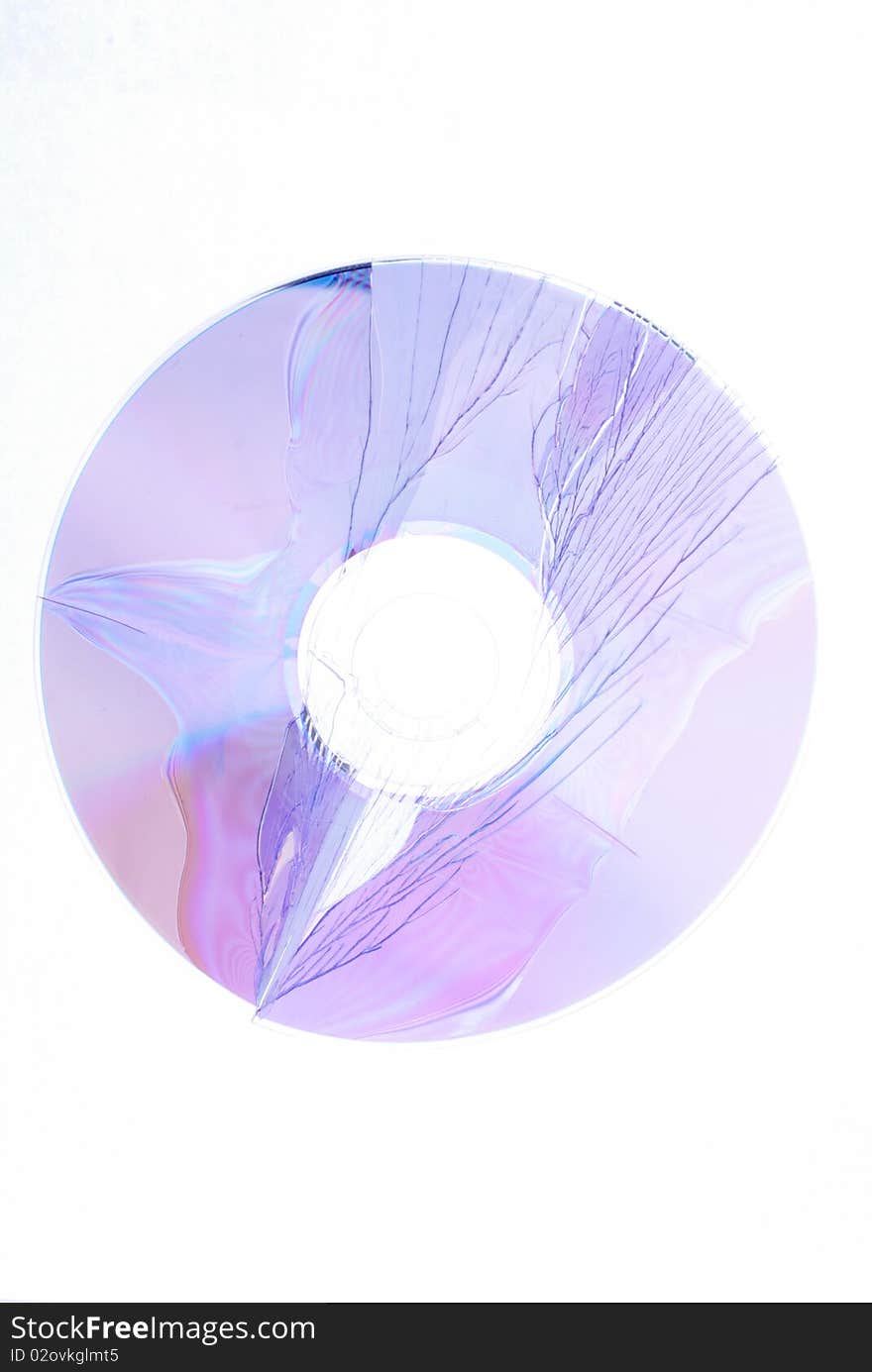 Damaged cd-r as a symbol of data loss or damage. Damaged cd-r as a symbol of data loss or damage