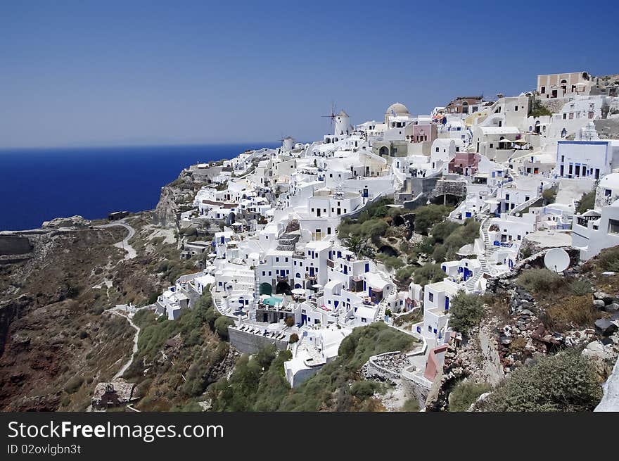 Santorini view with white houses and sea