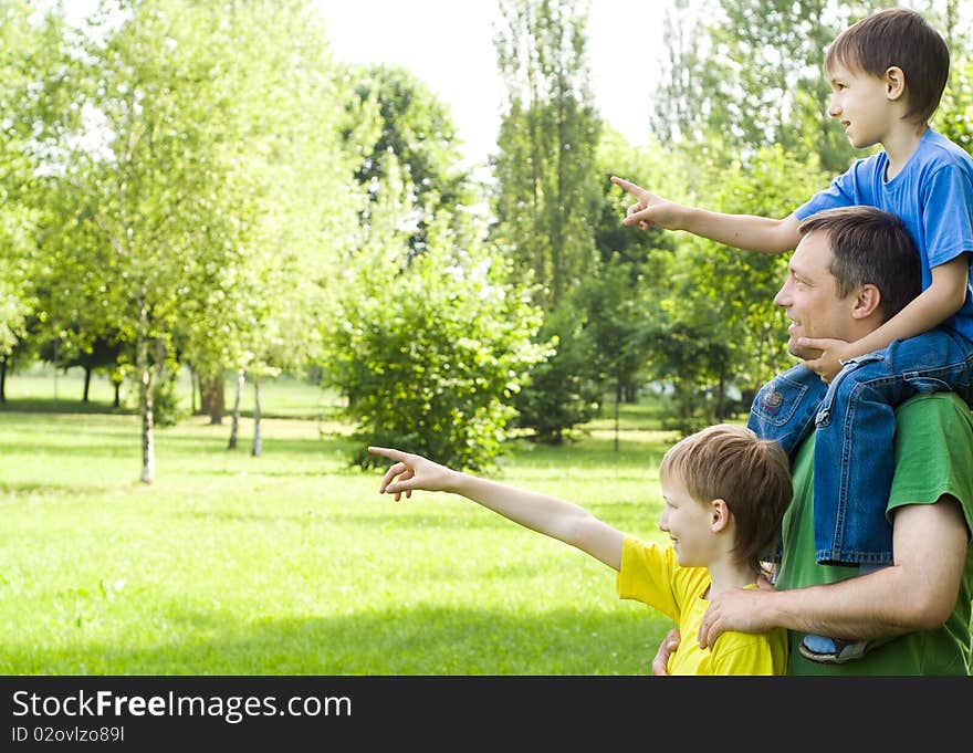 Dad with young children outdoors. Dad with young children outdoors