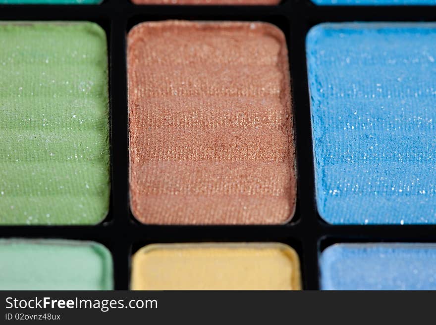 Brown and blue make-up eyeshadows