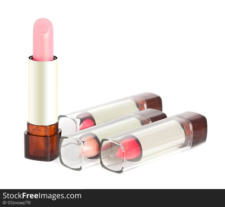 Pink lipsticks on white