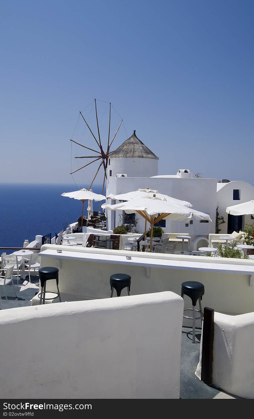 Santorini view with windmills