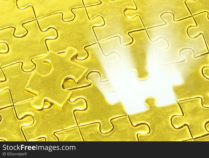 Background of gold jigsaw puzzle