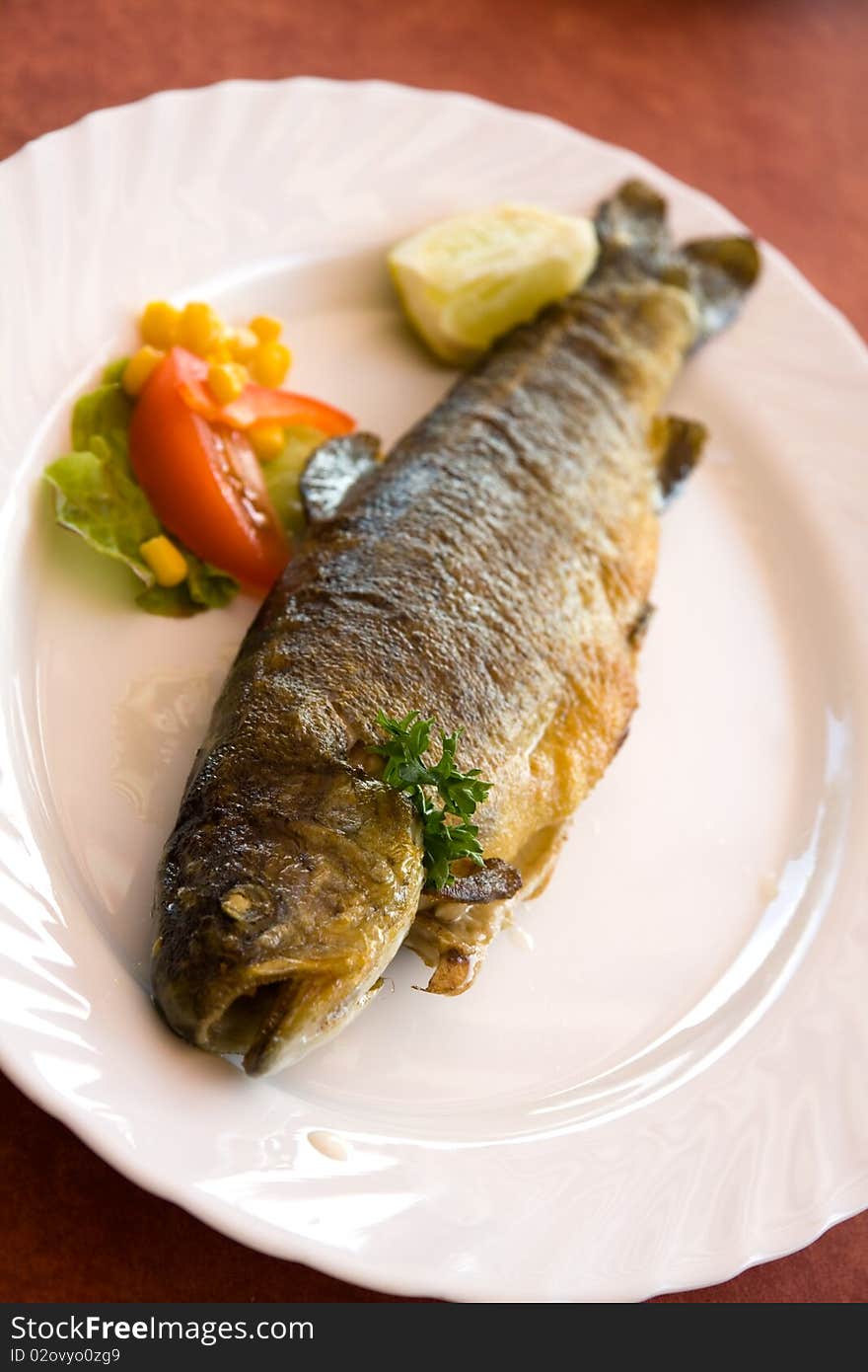 Fish meal,grilled trout with cream butter