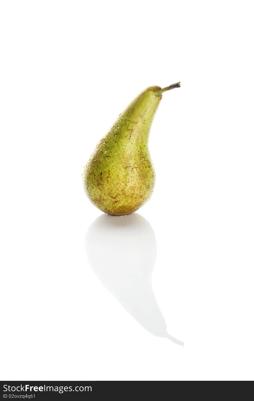 Pear, shot on a white background. It has water droplets and is a frontal view.