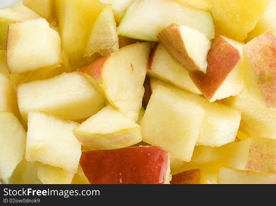 Background of apples, oranges, peaches, pears and orange juice. Fruit salad