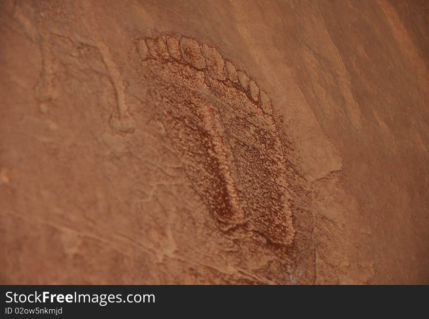 Footprints carved into a rock wall at Wadi Rum, a UNESCO World Heritage site in Jordan. Footprints carved into a rock wall at Wadi Rum, a UNESCO World Heritage site in Jordan.