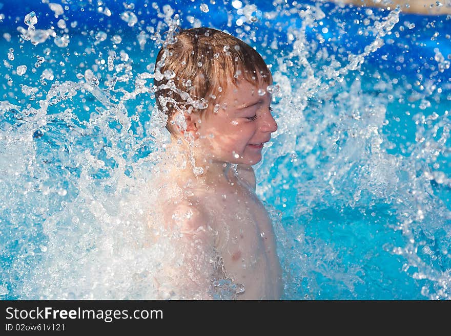 Playing in water on a hot sunny day. Playing in water on a hot sunny day