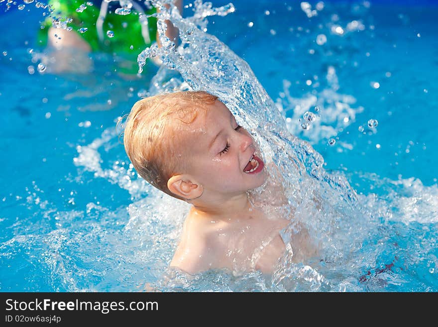 Playing in water on a hot sunny day. Playing in water on a hot sunny day