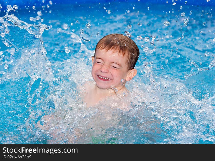 Playing in water on a hot sunny day. Playing in water on a hot sunny day