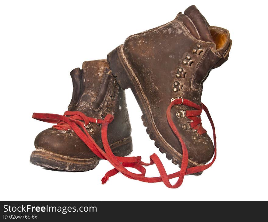 Old dirty boots on white background. Old dirty boots on white background