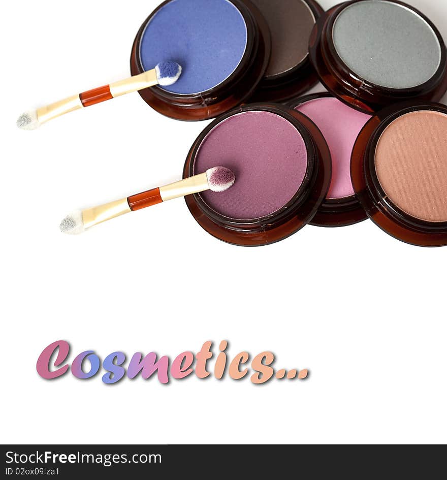 Make-up eyeshadows and cosmetic brush