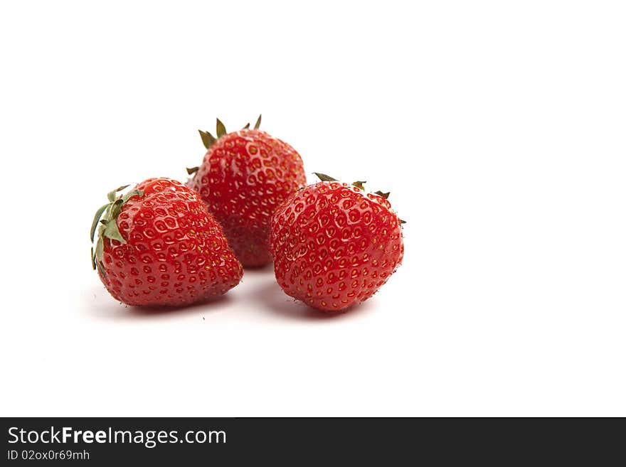 Three Fresh Strawberries on White Isolated Background. Three Fresh Strawberries on White Isolated Background